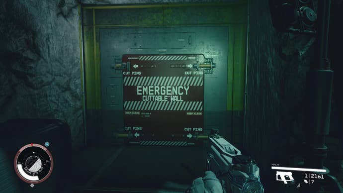 The player looks towards an emergency cuttable wall in Starfield