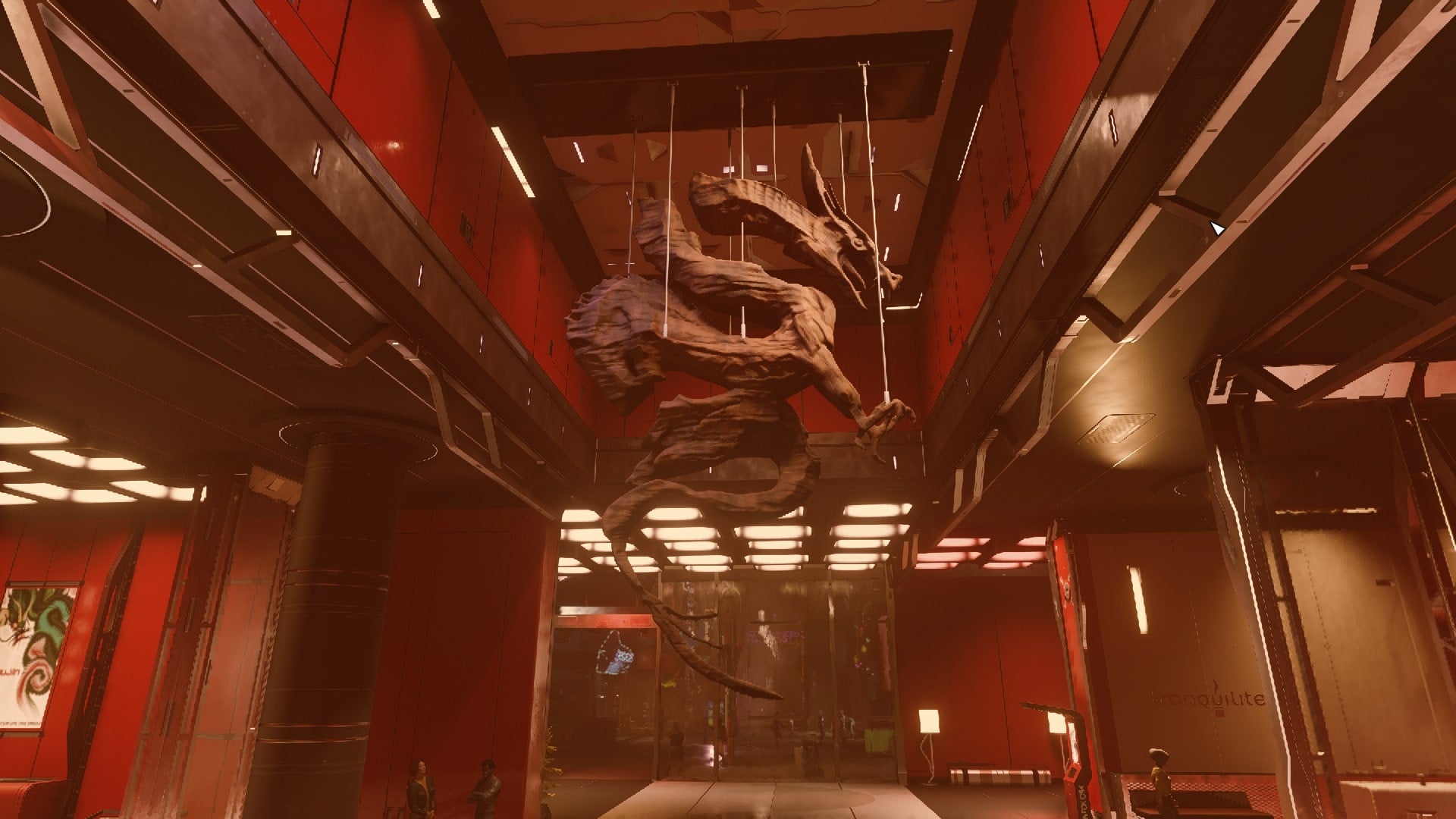 The lobby of Ryujin Tower in Starfield, where a dragon figure hangs from the ceiling - 1