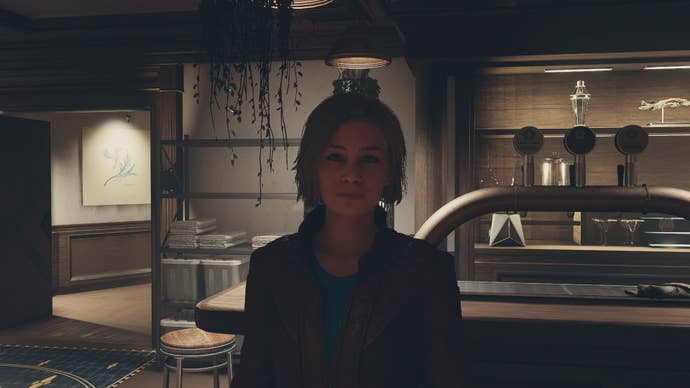 Starfield image showing Sarah Morgan stood in a dim bar at the Lodge.