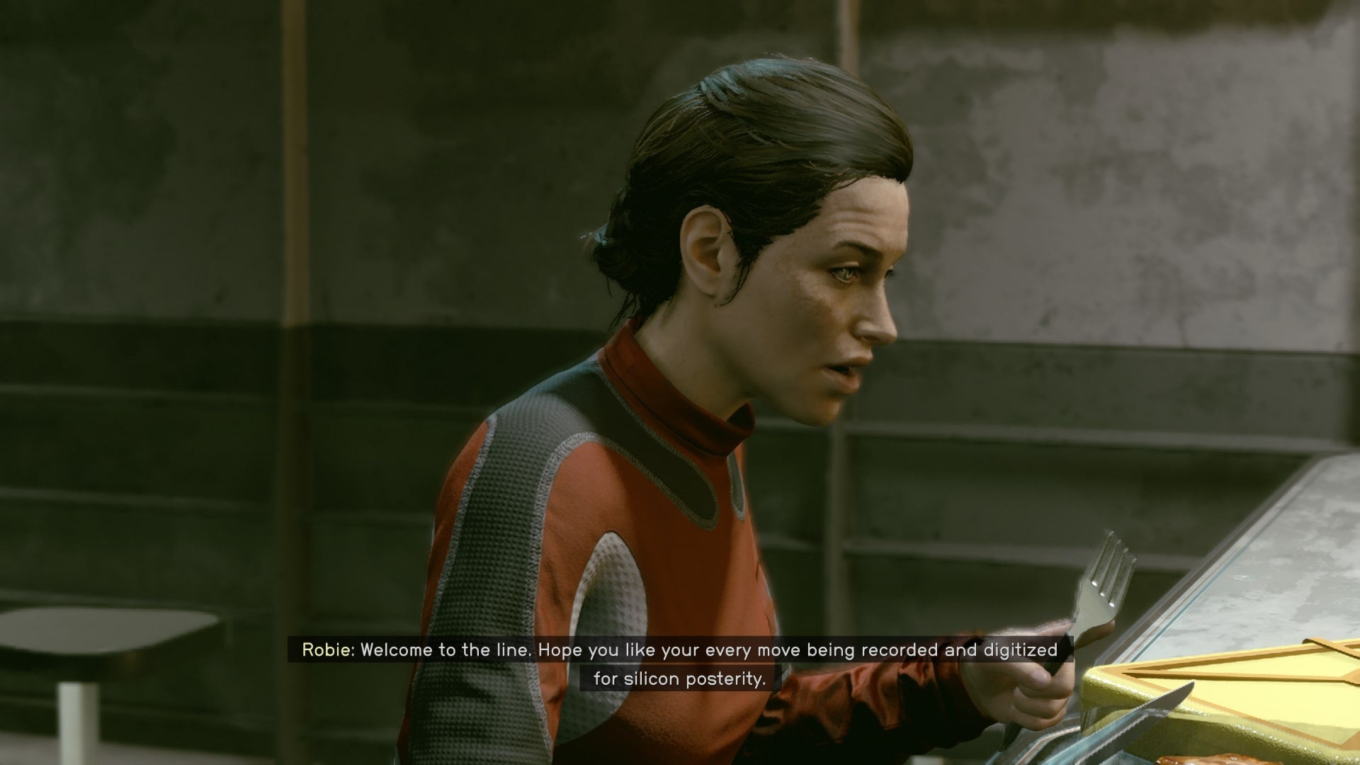 The player speaks to Neshar's contact, Robie, in the break room of Xenofresh Fisheries in Starfield - 1