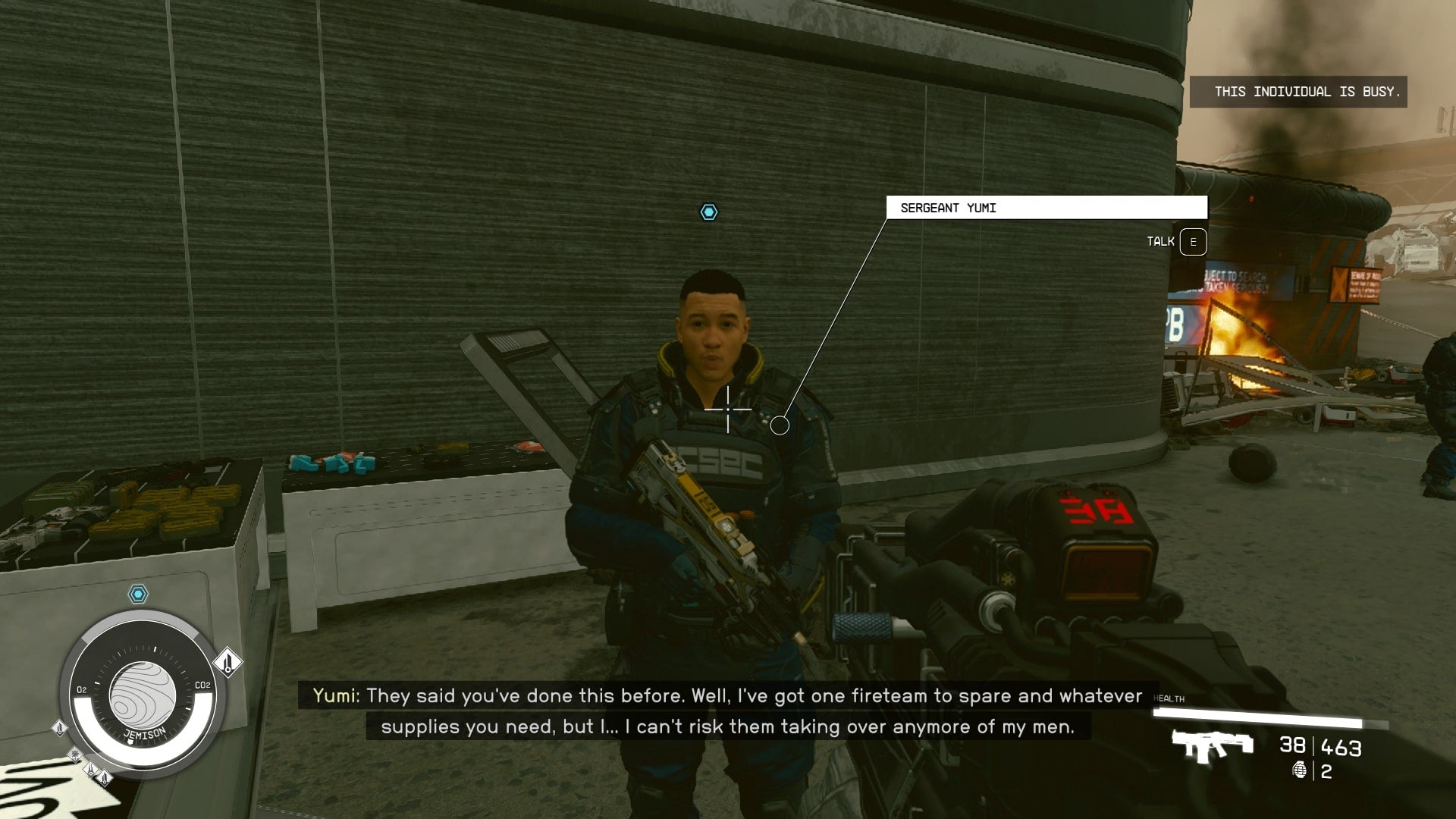 The player speaks with Sergeant Yumi in the New Atlantis spaceport in Starfield