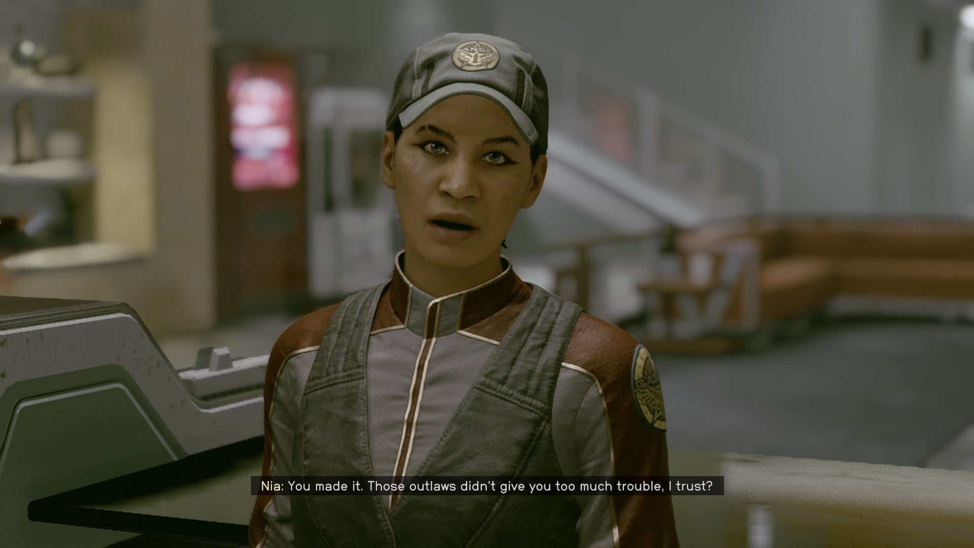 The player speaks to Nia Kalu within HopeTech in Starfield