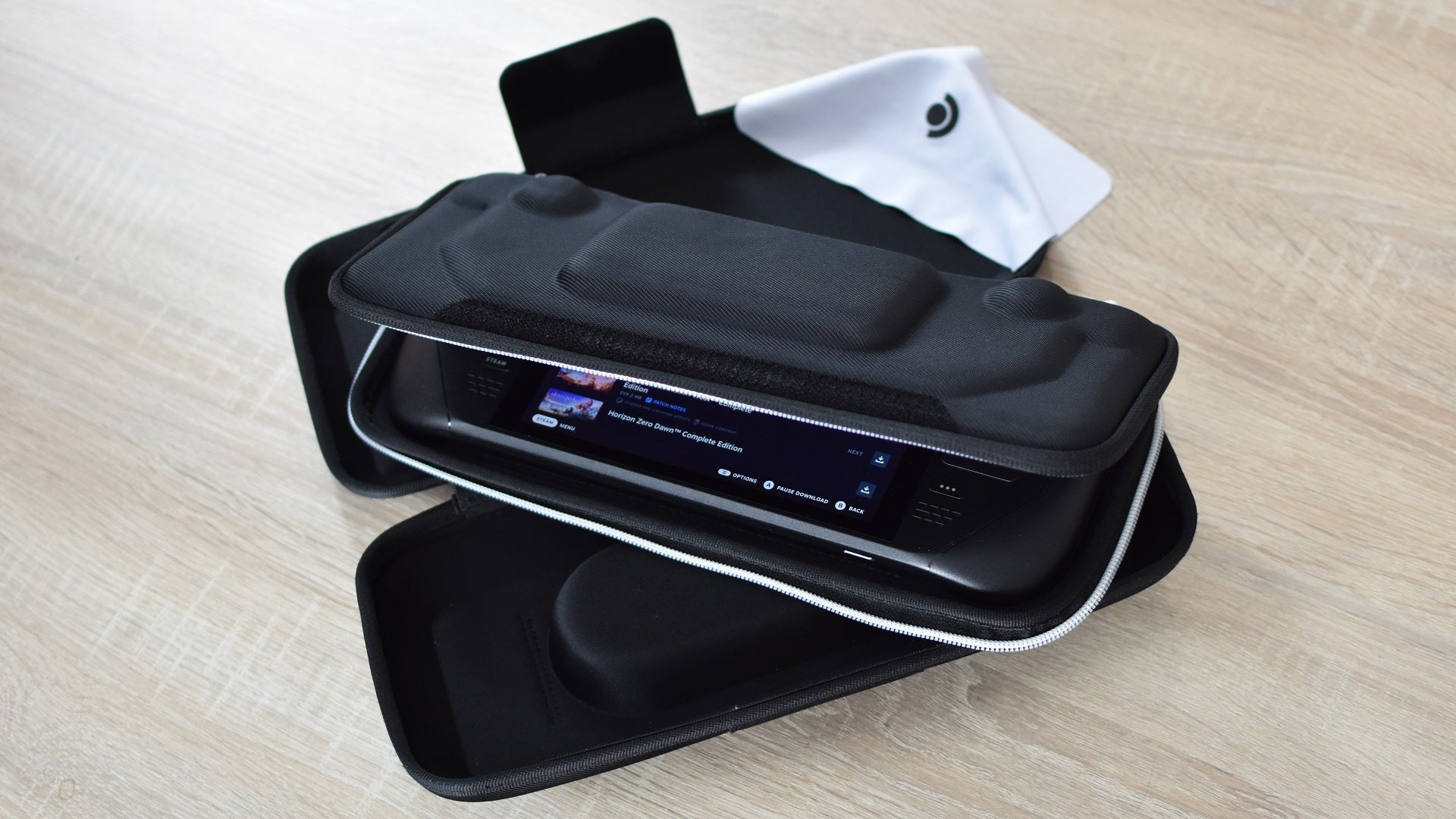 A Steam Deck inside the multi-layed case that Valve bundles with 1TB Steam Deck OLEDs. - 7