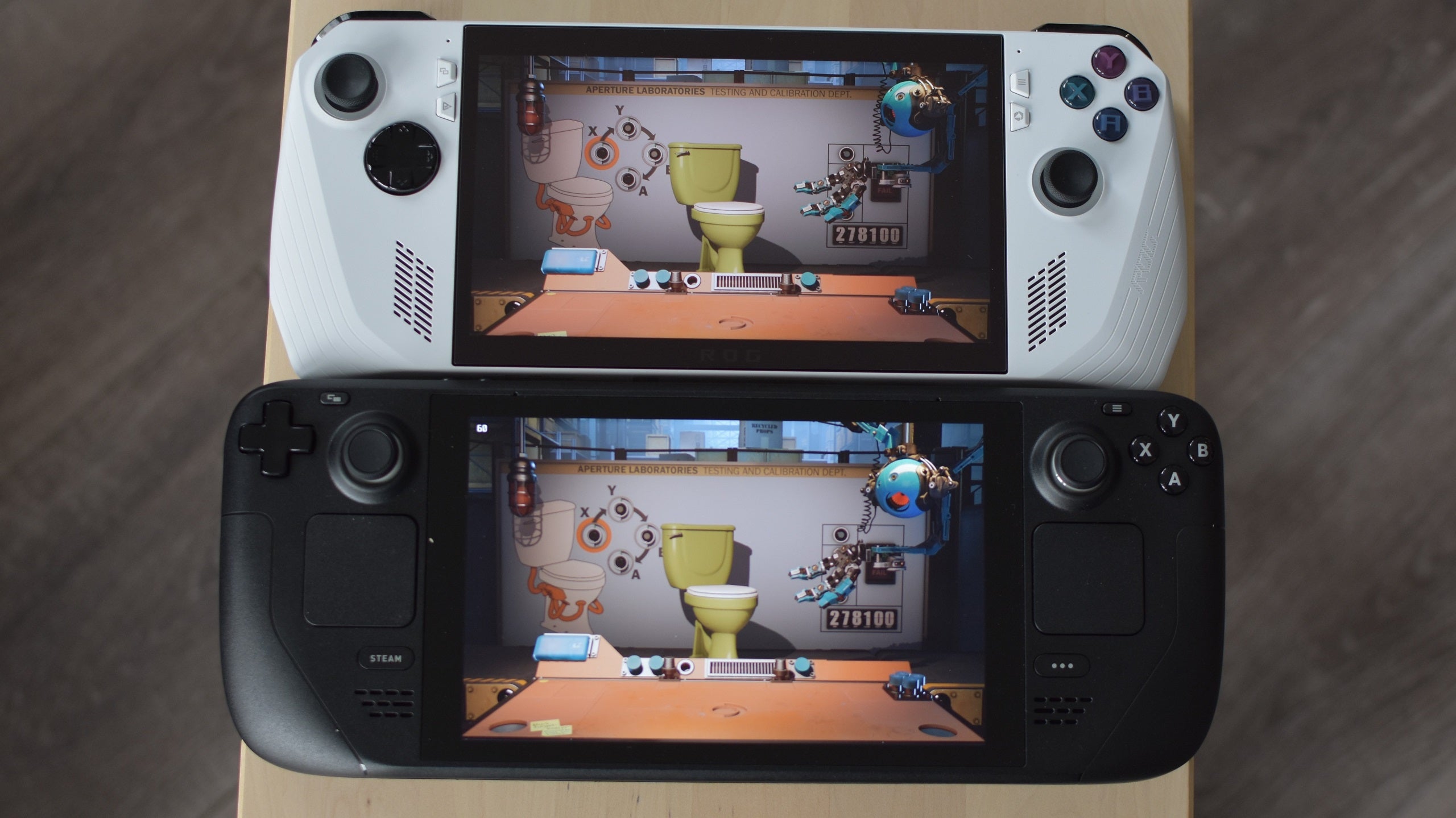 Aperture Desk Job running on both a Steam Deck and Asus ROG Ally simultaneously.