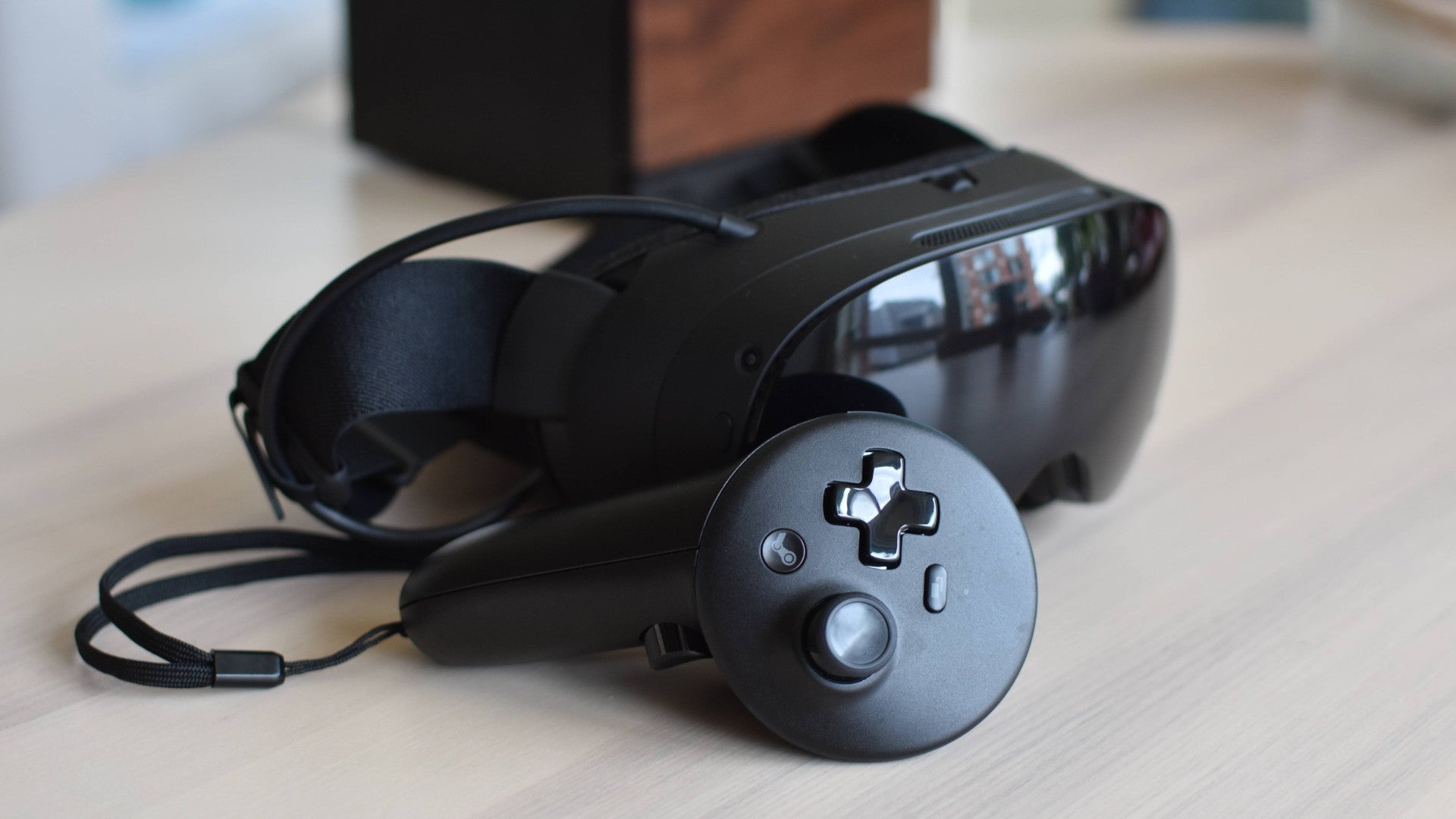 The Steam Frame VR headset and one of its controllers.