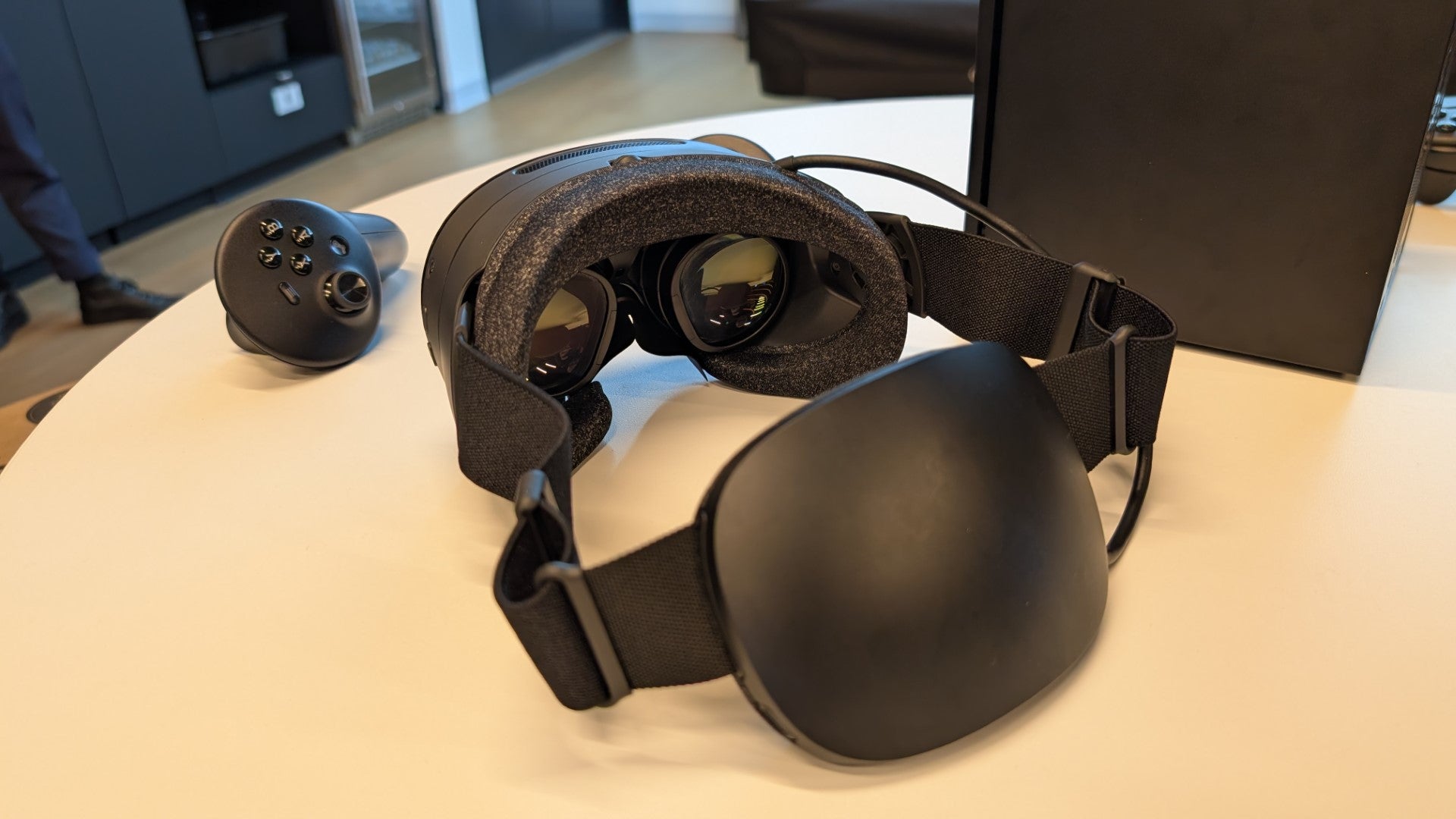 A rear view of the Steam Frame VR headset, with its lenses visible.