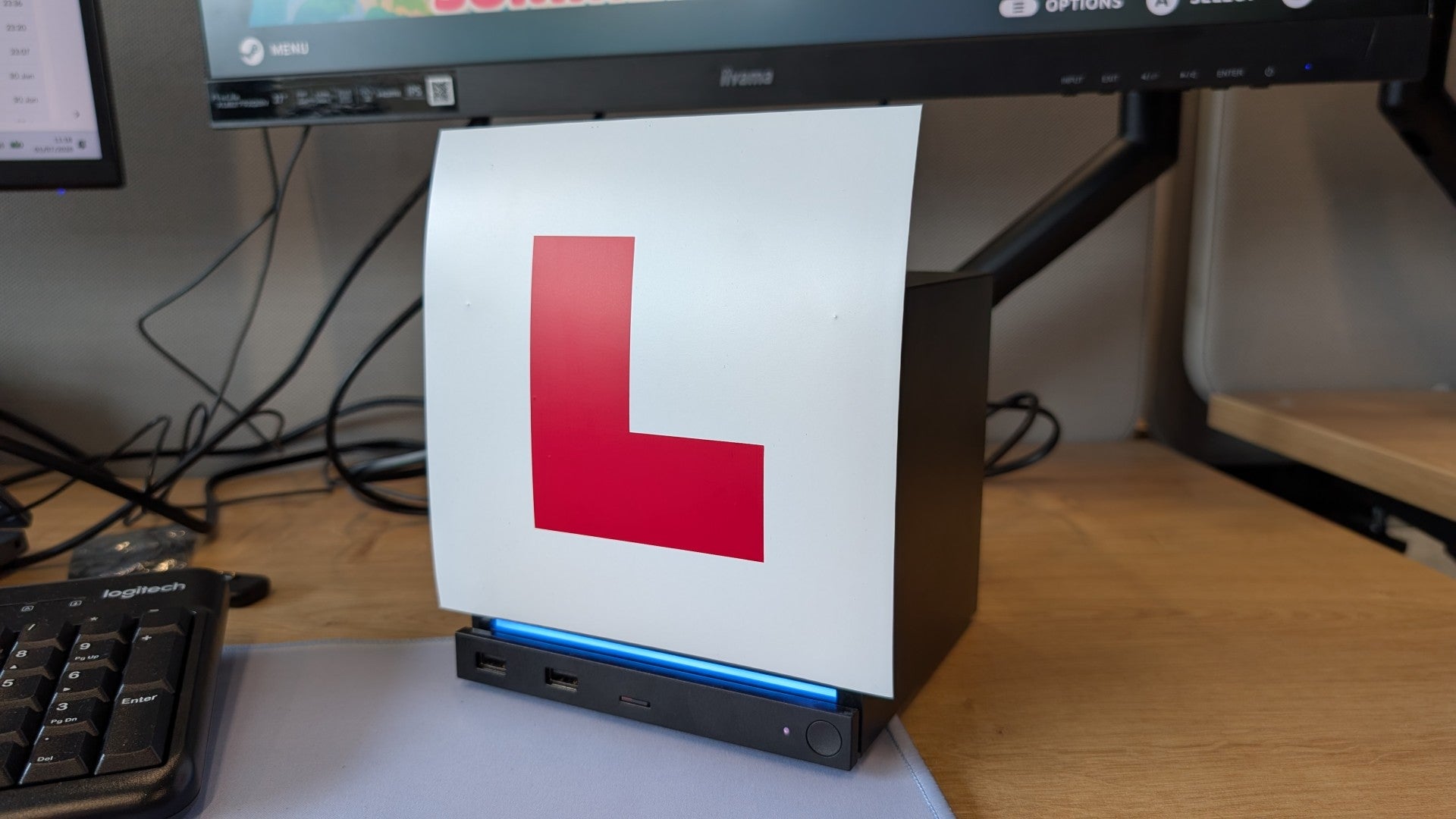 A Steam Machine with a British learner L Plate acting as a faceplate