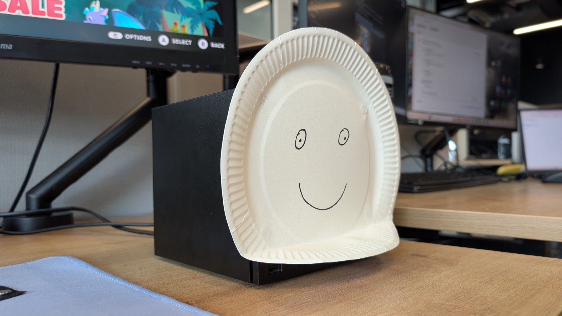 A Steam Machine with a a paper flate (with a face drawn on it) acting as a faceplate.