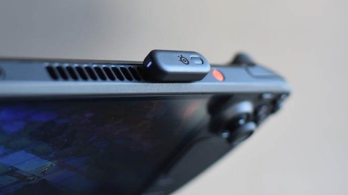 The SteelSeries Arctis GameBuds’ 2.4GHz receiver plugged into a Steam Deck’s USB-C port.