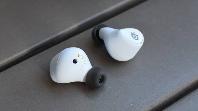 The SteelSeries Arctis GameBuds on a table.
