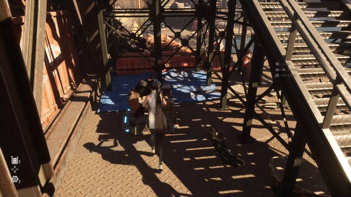 Eve pushing a trolly onto a Switch at the Plant area in Stellar Blade.