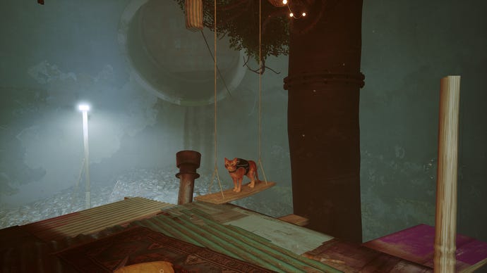 A cat sits on a garden swing in Stray.