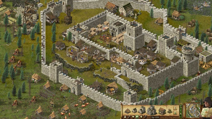 Screenshot from Stronghold: Definitive Edition, showing a castle in the middle of greenery.