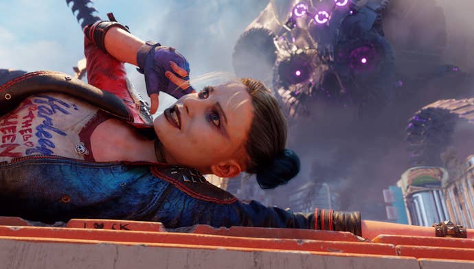 Harley Quin chats on a call while laying down in front of Braniac’s giant, purple ship in Suicide Squad: Kill The Justice League.