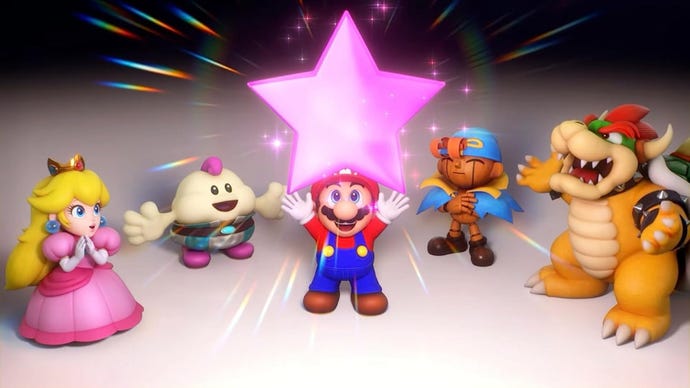 Peach, Bowser, Mario, and others stand in a half-circle, holding a star above their heads.