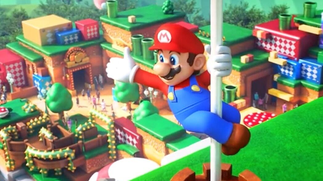 Promotional art for Super Nintendo World showing Mario clinging to a flagpole while the theme park is visible behind him.