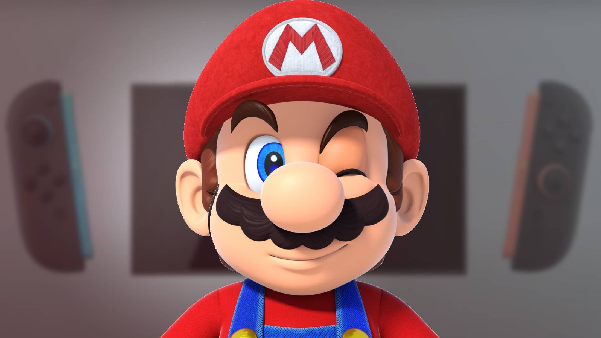 Mario's big winking face over an image of the Switch 2 - 1