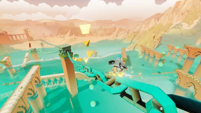 Sword of the Sea screenshot showing you grinding down giant green chains over water and sand