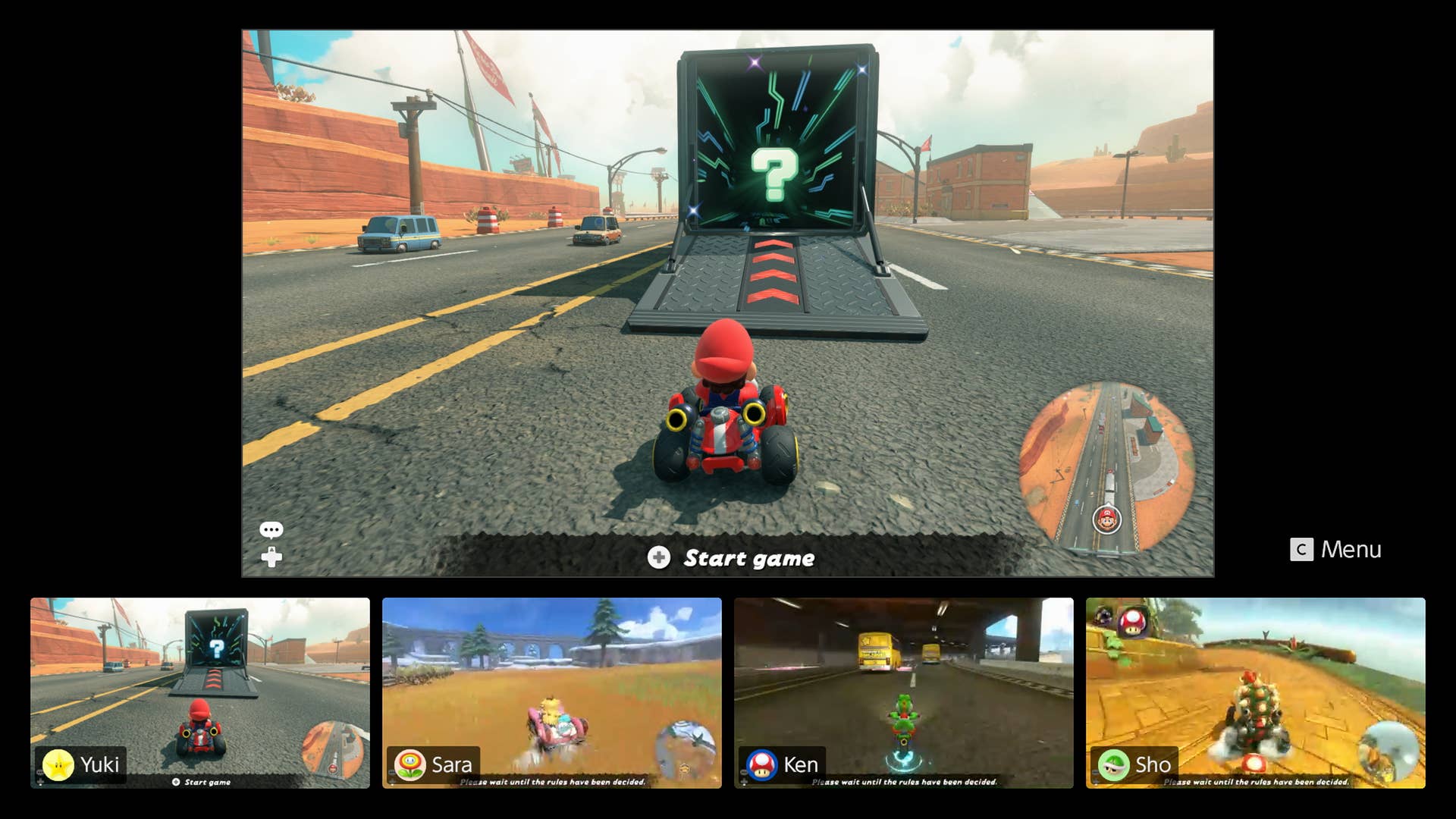 Mario Kart World official screenshot showing gamechat and the main player approaching a truck with a question mark in it