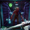 A humanoid mutant attacks in the System Shock remake.