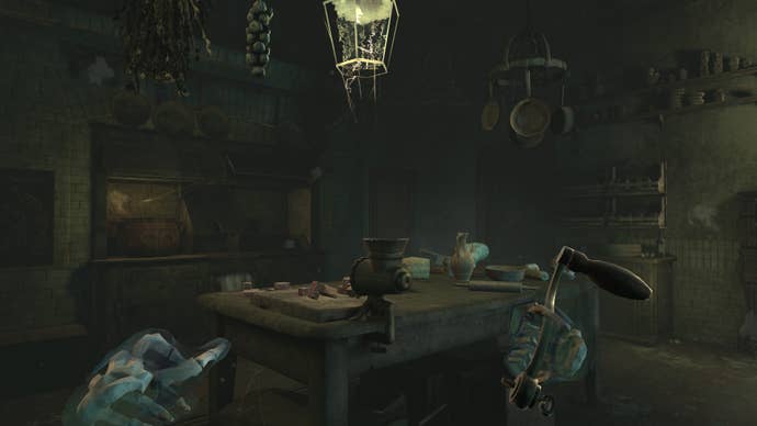 A screenshot of The 7th Guest VR showing an old-fashioned kitchen. The player’s disembodied hands are holding a crank, and rotting food is piled high among the shadows.