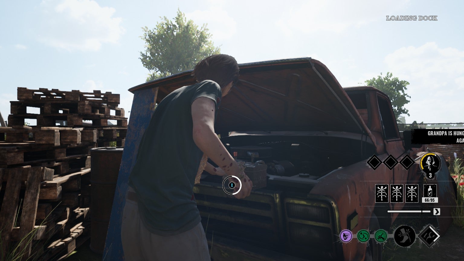 The Hitchhiker looks into the engine of a dilapidated truck. A quick-time button tells the player to hold X to switch on the power and electrify the exit gate