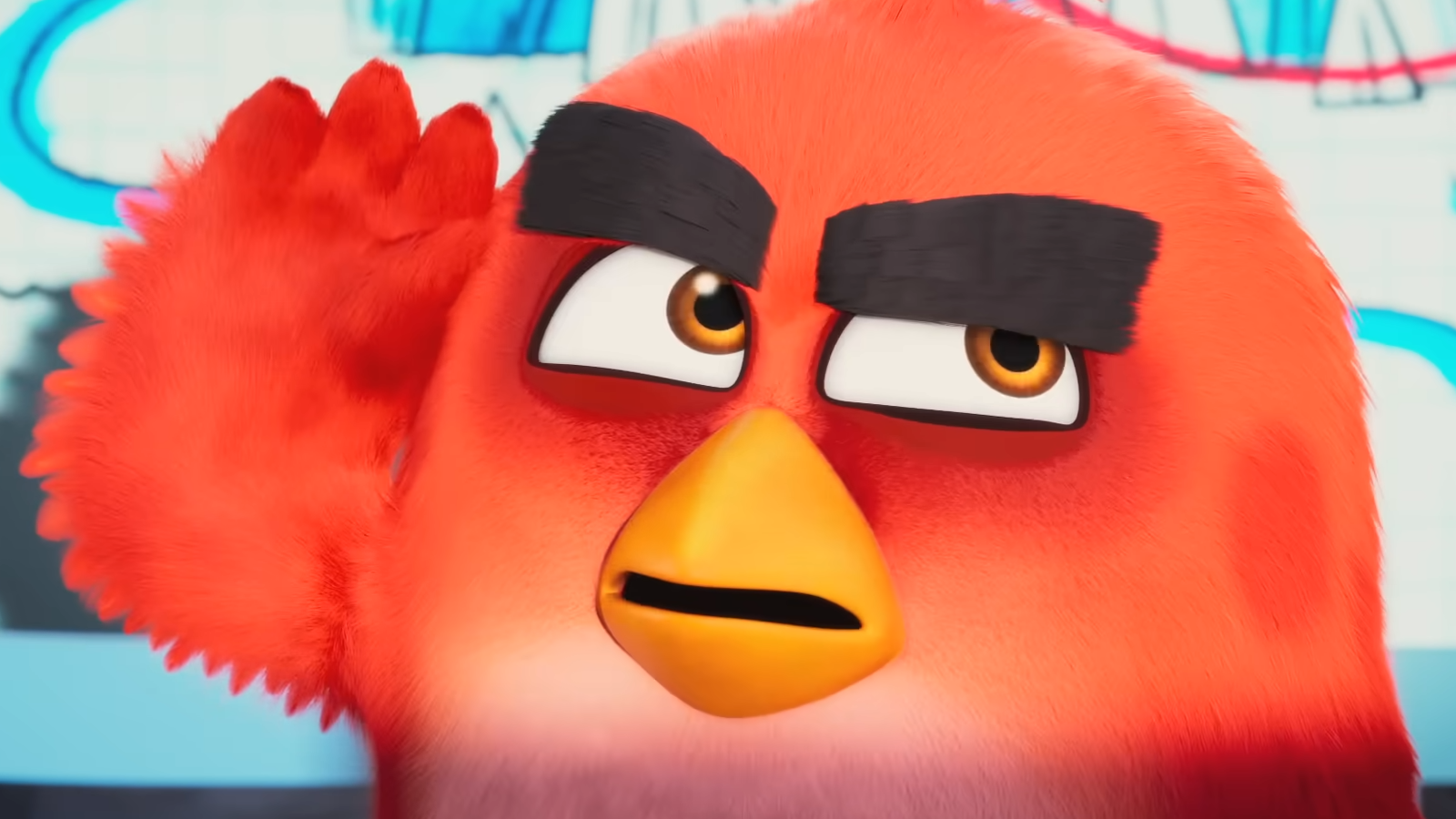 Screenshot from The Angry Birds Movie 2 trailer showing close up of red cartoon bird with big eyebrows