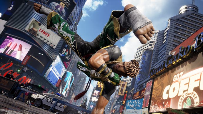 Eddy Gordo celebrates in Time Square with capoeira move and legs in the air
