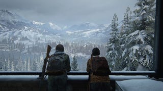 Ellie and Dina look away from the camera over the snowy peaks of Jackson, their home.