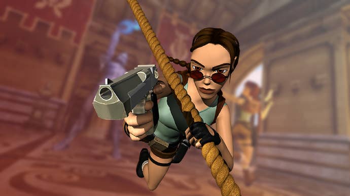 Lara Croft on a rope swing, aiming her guns at the camera, with a blurred image behind her