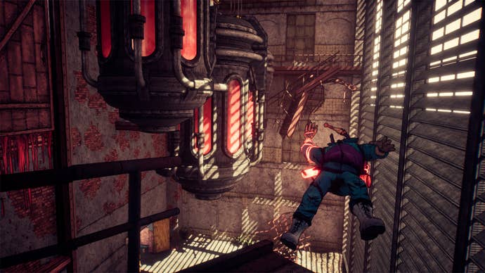 A screenshot of a man getting knocked off a gantry in a big industrial chamber from Trust