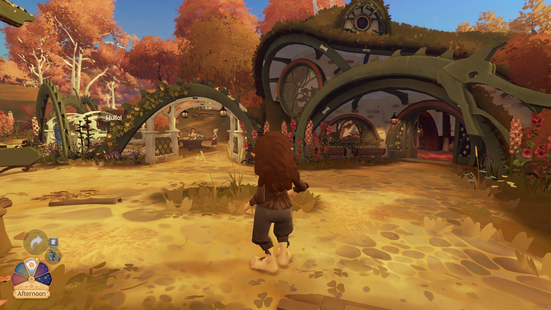The outside of the Green Dragon in Tales of the Shire, looking at the dragon-inspired fence.