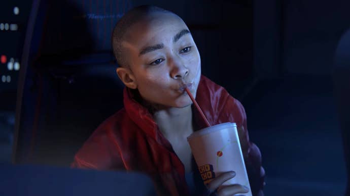Tati Gabrielle sipping a drink as bounty hunter, Jordan A. Mun in Intergalactic The Heretic Prophet