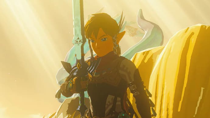 Link holds the master sword in the legend of Zelda: the tears of the kingdom