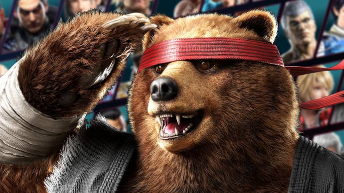 A close-up of Kuma the bear in Tekken 8, with the roster peeking out behind him. Kuma is saluting, and wearing his master Heihachi’s old clothes.