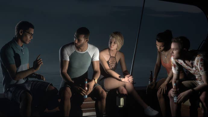 Brad, Alex, Julia, Fliss, and Conrad sit on the boat deck at night, dimly lit by a flashlight.