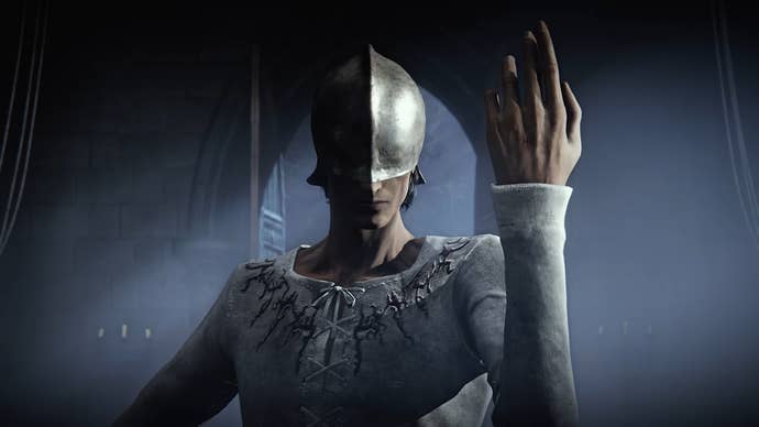 The Duskbloods screenshot showing close up of man with helmet covering face holding arm upwards