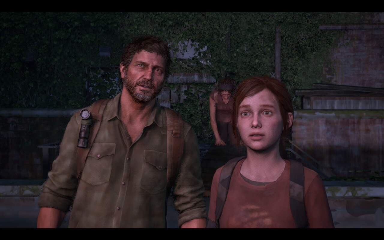 Joel and Ellie look out over Boston in in The Last of Us Part 1, running on a Steam Deck.