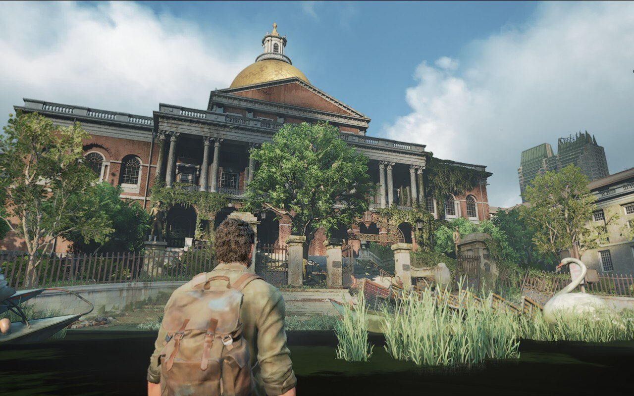 Joel approaches the Capitol Building in The Last of Us Part 1, running on a Steam Deck.