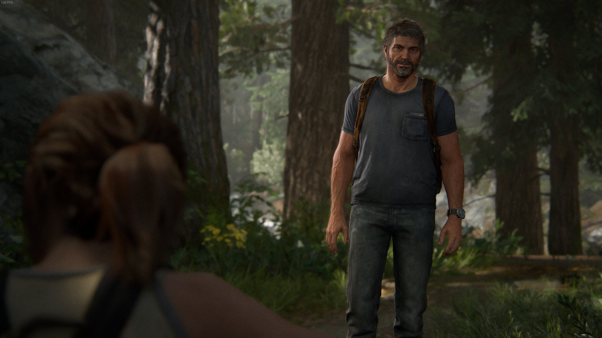 A smiling Joel approaches Ellie in a cutscene from The Last of Us Plart II Remastered. - 1
