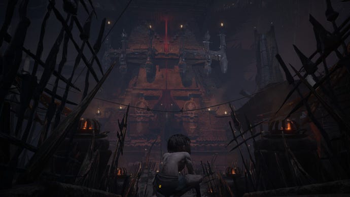 Gollum stands in front of a dark fortress in The Lord Of The Rings: Gollum