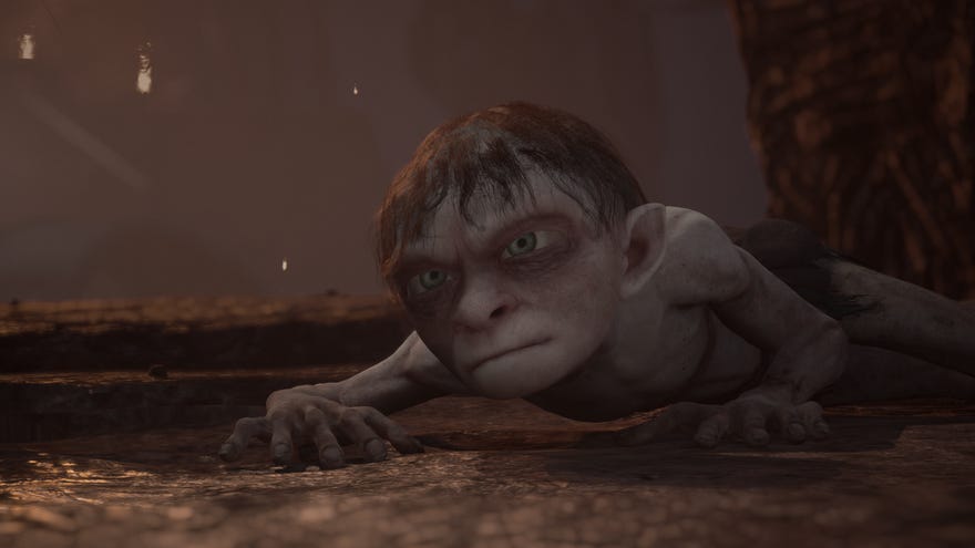 A scowling Gollum lays on the floor of his prison cell in The Lord of the Rings: Gollum.