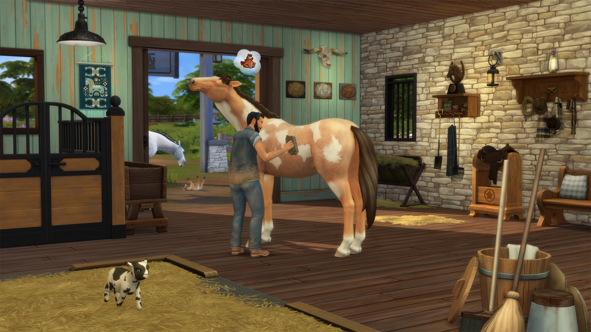 A Sim grooms a horse inside a stable in The Sims 4 Horse Ranch. - 3