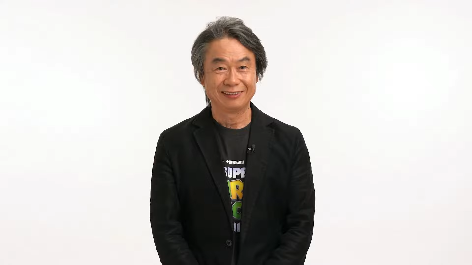 Screenshot from Super Mario Bros Movie Nintendo Direct showing Shigeru Miyamoto on a white background