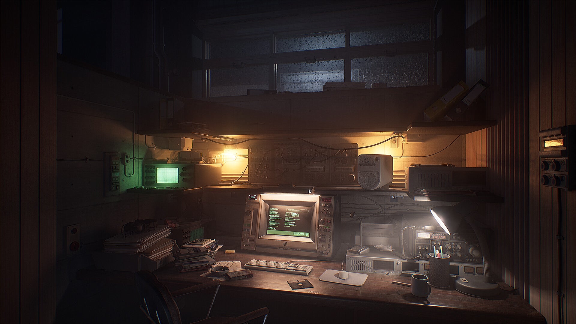A computer table with a 90s-style monitor and keyboard in a shadowy, cluttered room from The Lost Wild.