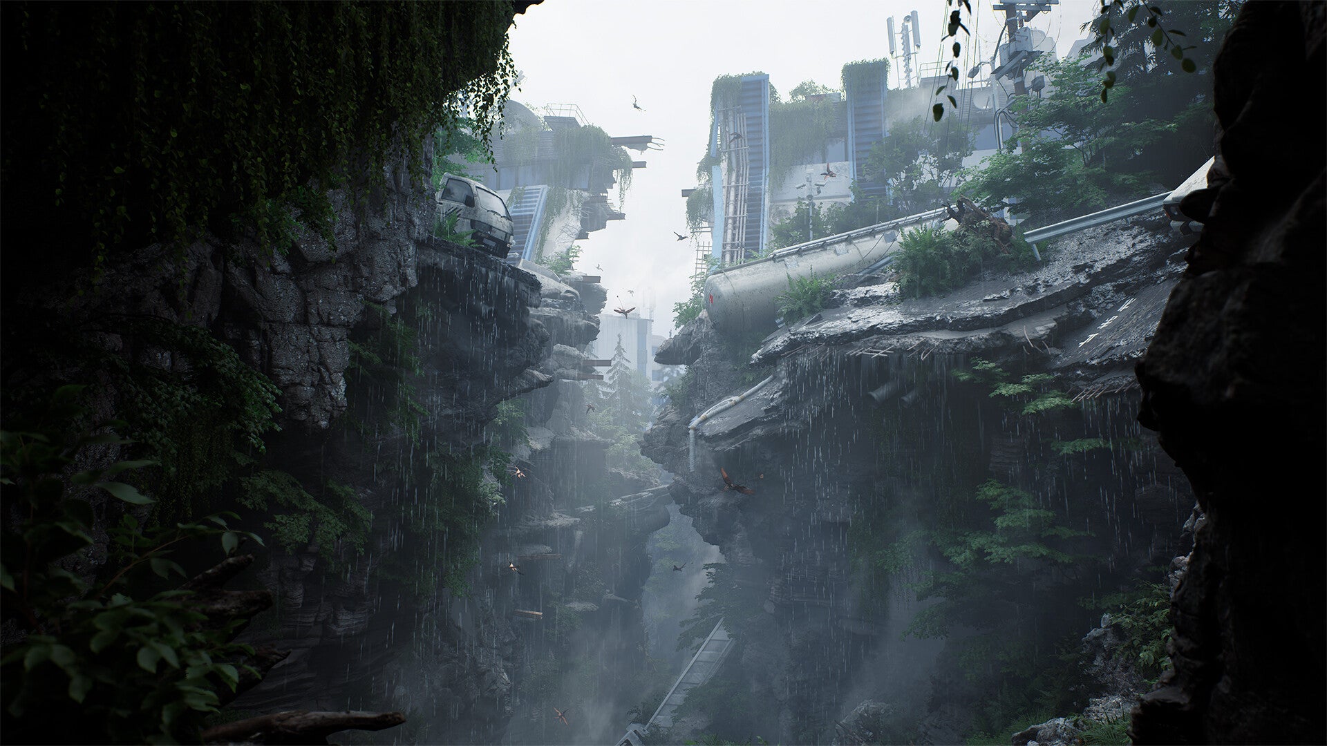 A scientific base split by a huge crevice covered in jungle and rain, from The Lost Wild.