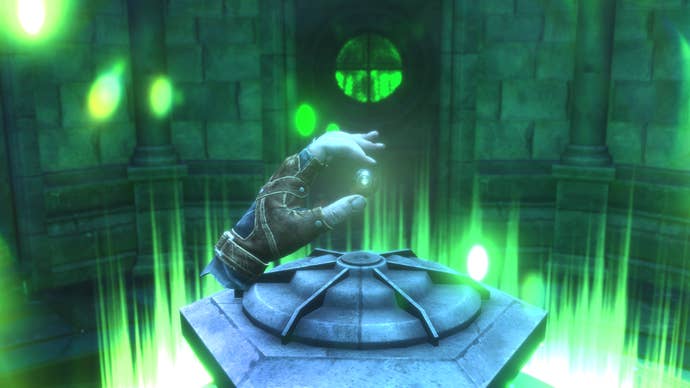 A disembodied hand holds a glowing green, mechanical eye