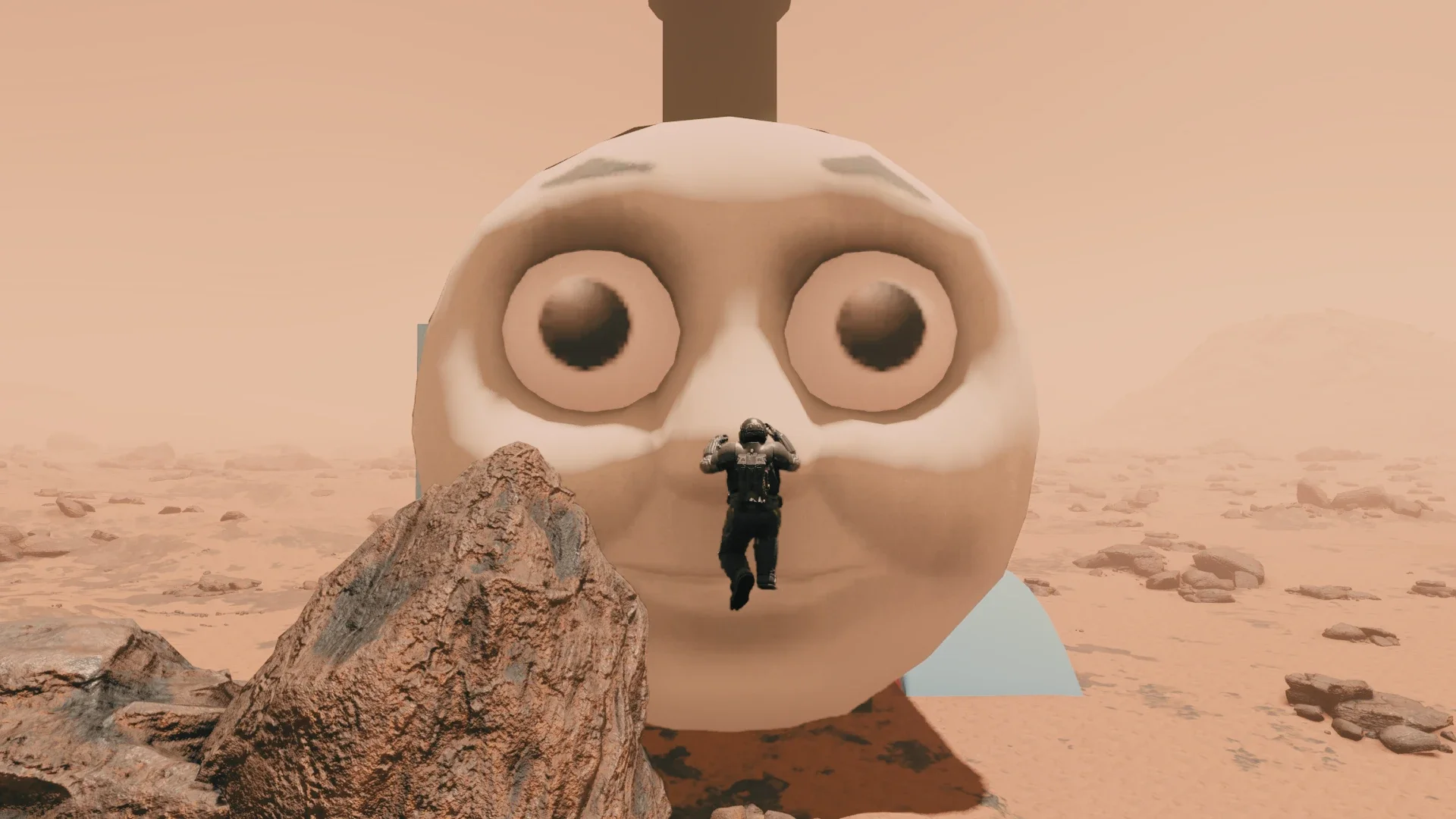 Thomas the Tank Engine&rsquo;s big, horrible face takes up most of the shot on a barren planet in Starfield.