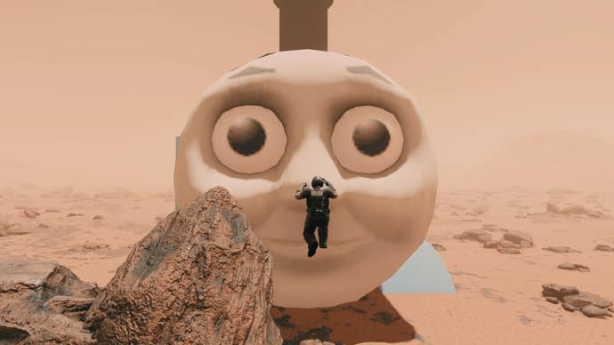 Thomas the Tank Engine's big, horrible face takes up most of the shot on a barren planet in Starfield.