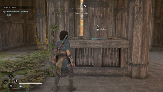 Nae looking at a lost page at the Todaiki temple in the shadows of Creed of Assassin.